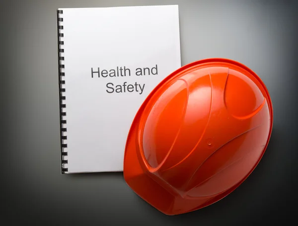 Registro de salud y seguridad con casco — Foto de Stock