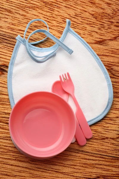 Bibbie, ciotola e cucchiaio per il bambino — Foto Stock