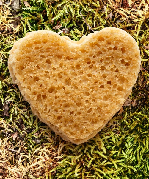 Slice of bread in heart form — Stock Photo, Image
