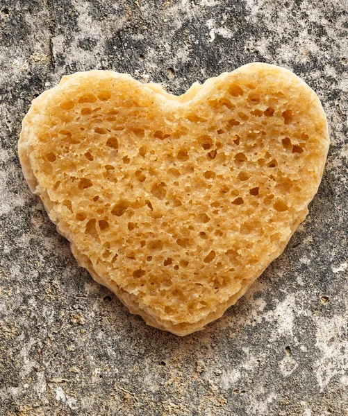 Slice of bread in heart form — Stock Photo, Image