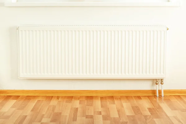 White radiator in apartment — Stock Photo, Image