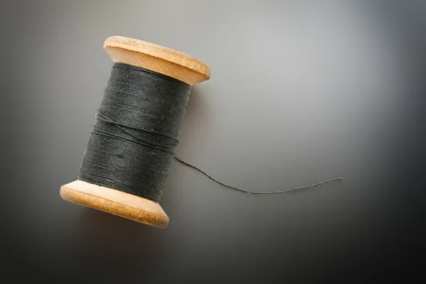 Black thread in closeup — Stock Photo, Image