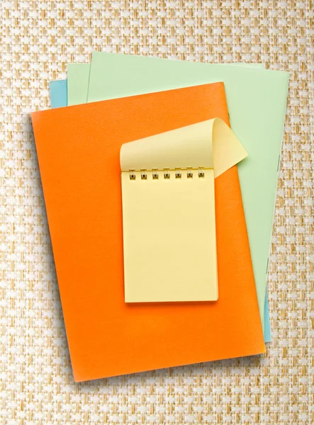Notepad on colored papers — Stock Photo, Image