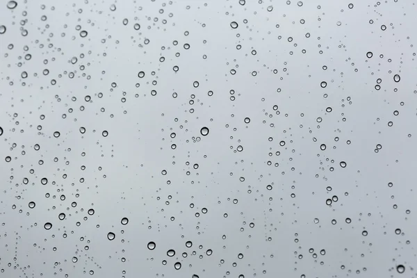 Cold rain drops on window — Stock Photo, Image