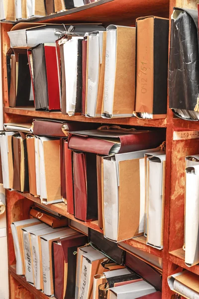 Paper documents stacked on shelves — Stock Photo, Image