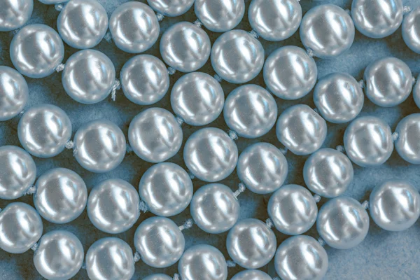 Hromádka bílých perel — Stock fotografie