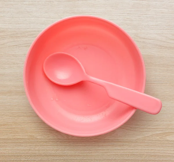 Pink plastic tableware — Stock Photo, Image