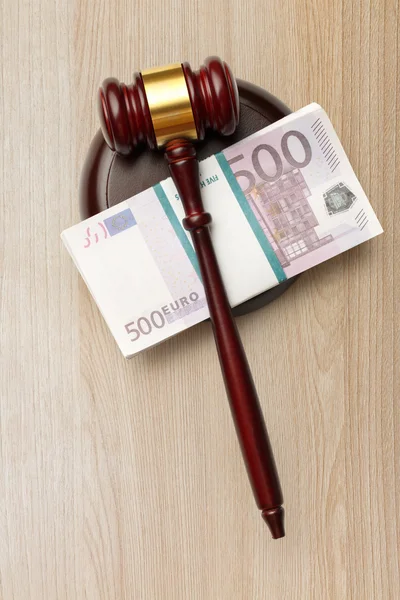 Wooden judges gavel and money — Stock Photo, Image