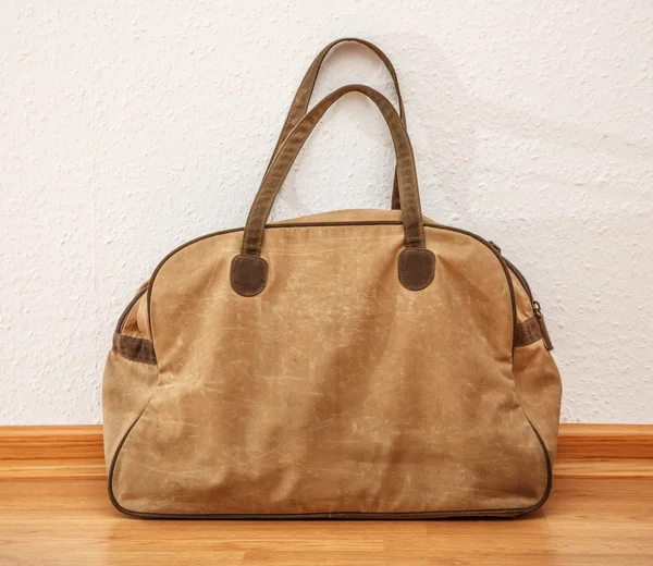 Bag on wooden floor — Stock Photo, Image