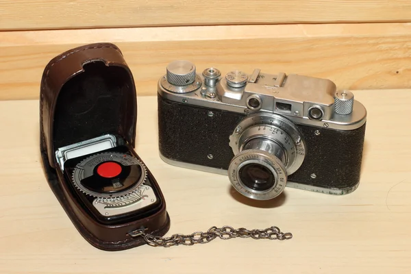 Vintage cameraand light meter — Stock Photo, Image