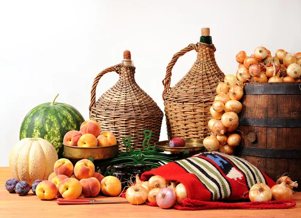 Onions, watermelon fruits and scales — Stock Photo, Image