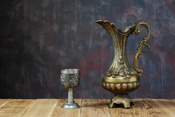 Metal jug and chalice — Stock Photo, Image