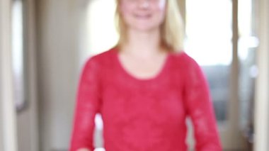 Woman's hands holding glass
