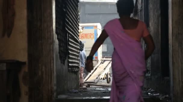 Men walking out of a building — Stock Video