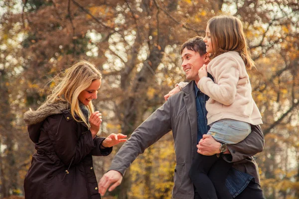 Family  walk in a park — Stock Photo, Image
