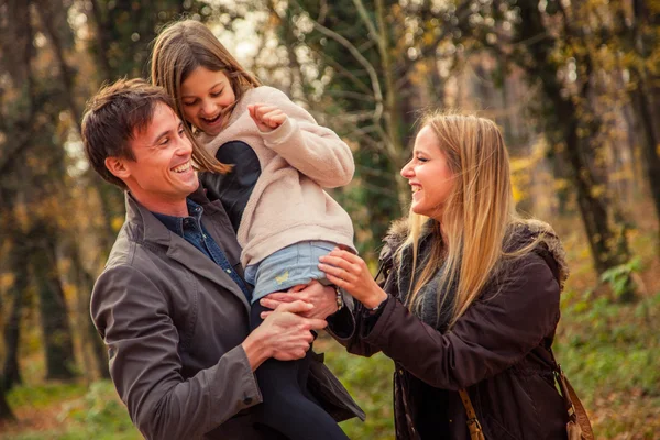 Family  walk in a park — Stock Photo, Image