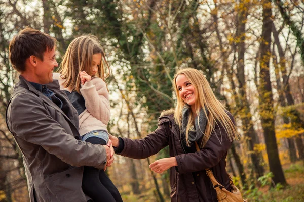 Family  walk in a park — Stock Photo, Image