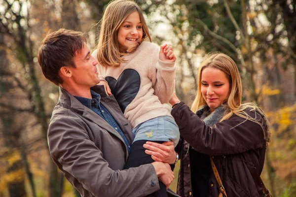 Family  walk in a park — Stock Photo, Image