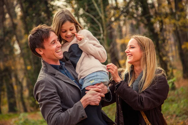 Family  walk in a park — Stock Photo, Image