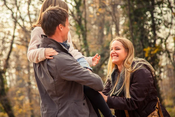 Family  walk in a park — Stock Photo, Image