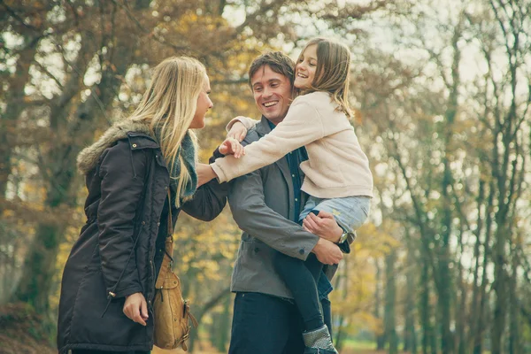 Family  walk in a park — Stock Photo, Image