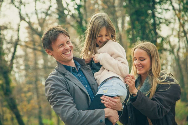 Family  walk in a park — Stock Photo, Image