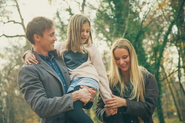 Family  walk in a park — Stock Photo, Image