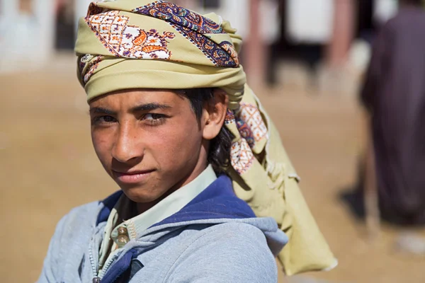 Local boy with head scarf — Stock Photo, Image