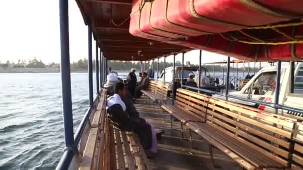 Local men on ferry boat — Stock Video