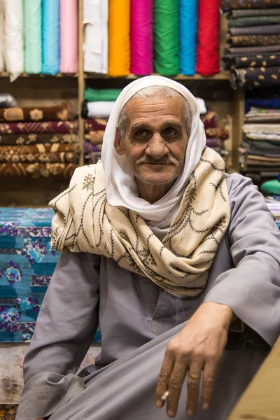 Vendor in his shop posing for camera — Stock Photo, Image