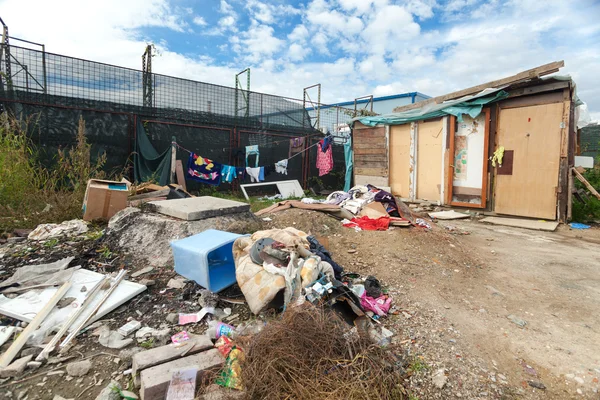 Ruined Roma Shack made from broken construction — Stock Photo, Image