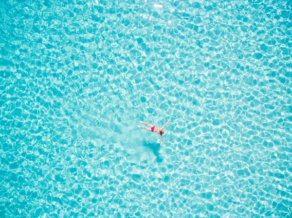 woman swimming in sea