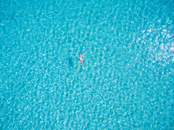 woman swimming in sea