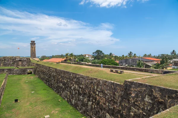 Walls of Galle fort with clock tower in distance — Stock Photo, Image