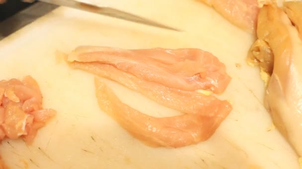 Chef cutting chicken meat — Stock Video