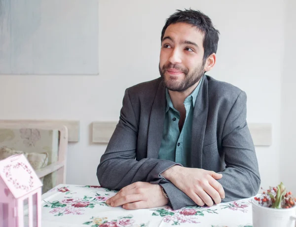 Man wearing jacket in restaurant — Stock Photo, Image