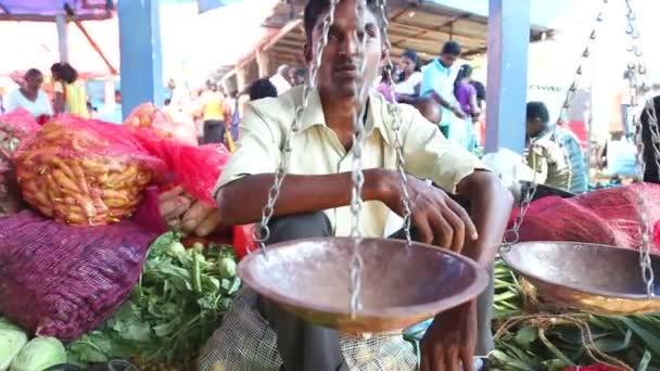 Man sitting in front of his scale — Stock Video