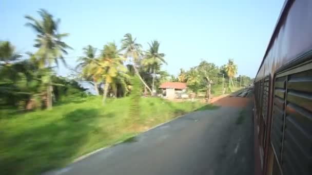 Colombo suburbs from passing train — Stock Video