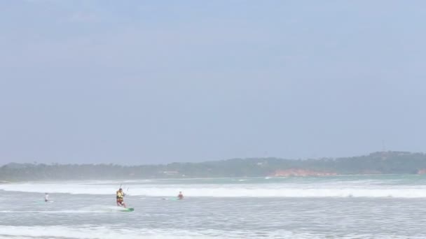 Kitesurfer jumping in the waves — Stock Video