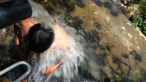 People enjoying the Ravana Falls — Stock Video