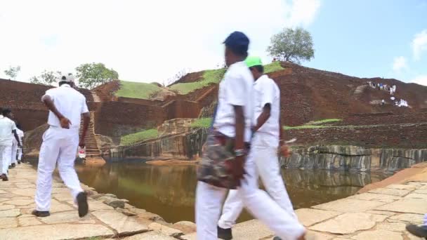 School boys passing by on the top of the Rock Fortress — Stock Video