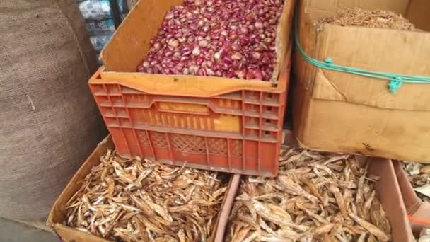 Boxes of dried fish displayed in the local market — Stock Video