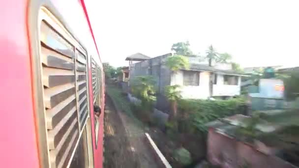 View of Colombo suburbs from passing train — Stock Video