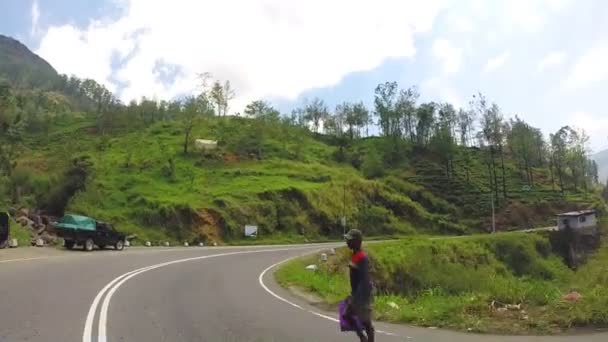 Sri Lankan tropical landscape from driving minivan. — Stock Video