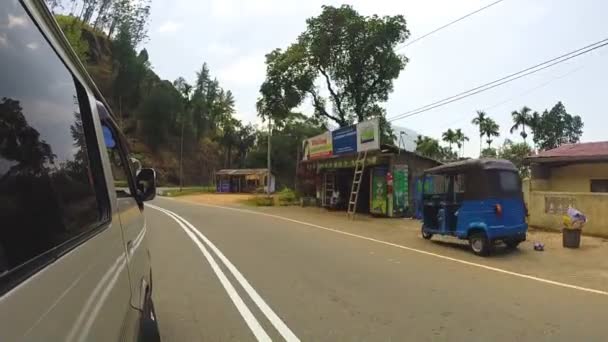 Sri Lankan tropical landscape from driving minivan — Stock Video