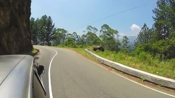 Sri Lankan tropical landscape from driving minivan. — Stock Video
