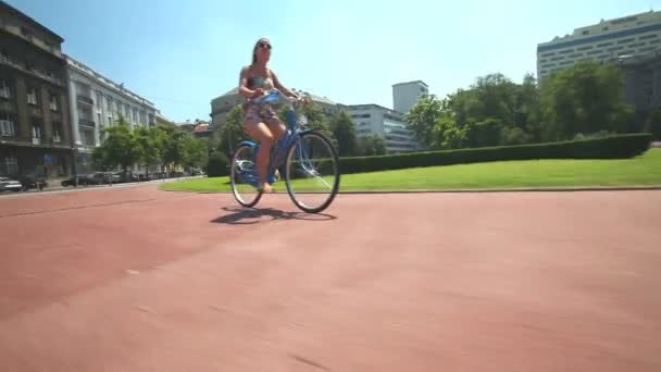 Woman cycling on old bike — Stock Video