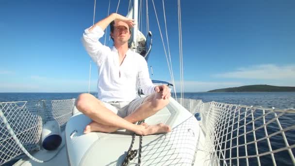 Man enjoying sailing trip on boat — Stock Video