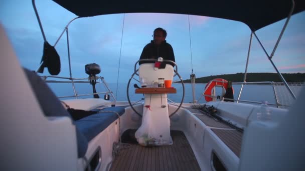 Skipper on sailing boat — Stock Video