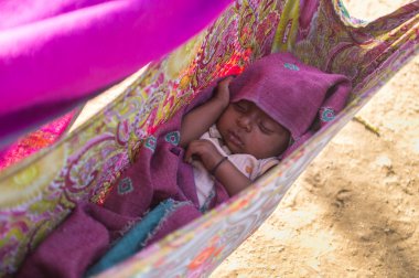 Indian baby sleeps